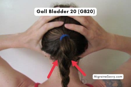 Hand position for Gall Bladder 20 meridian pressure point to help relieve migraine.